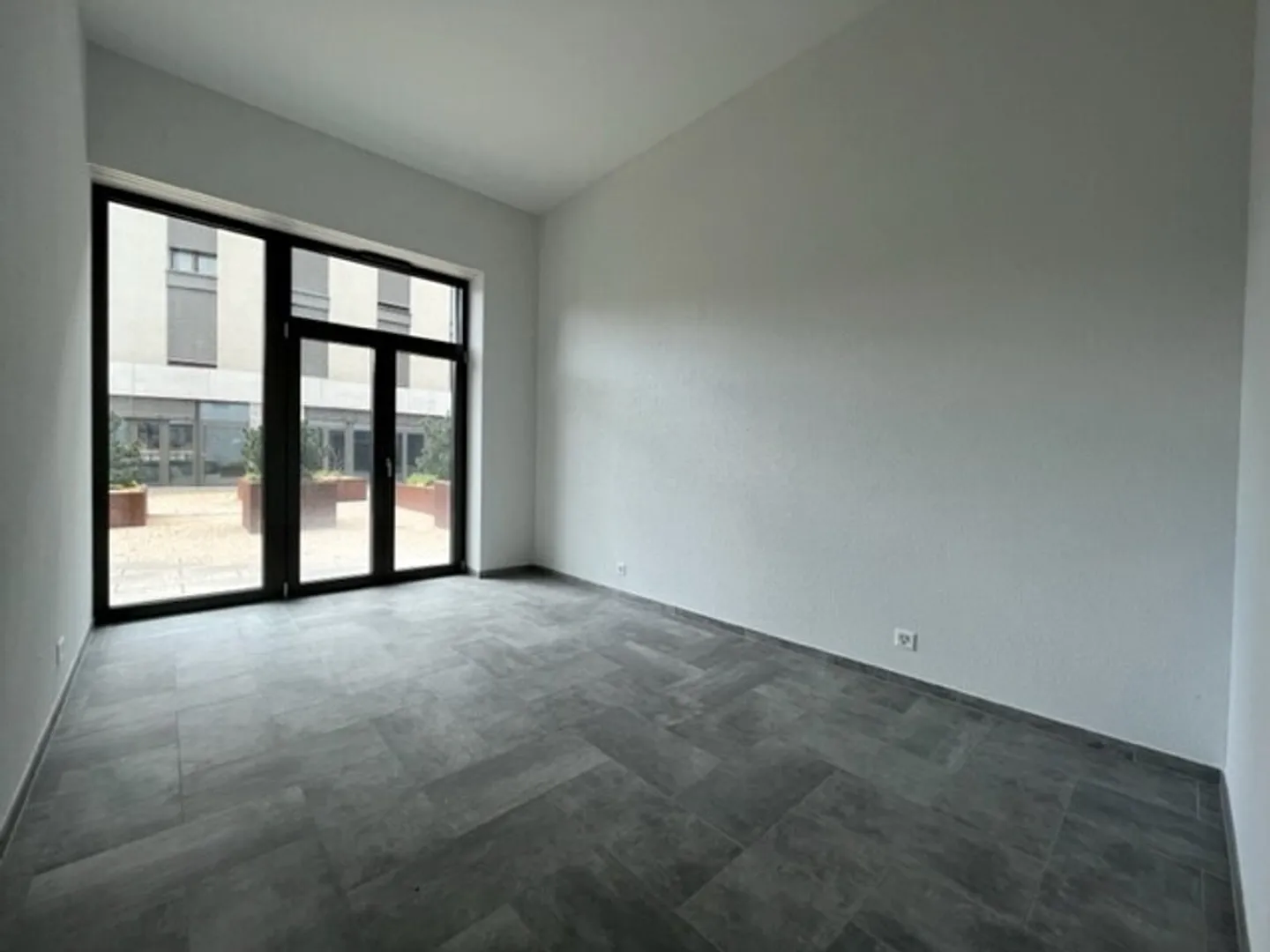 Charmante Wohnung mit Terrasse - Foto 3 von 9