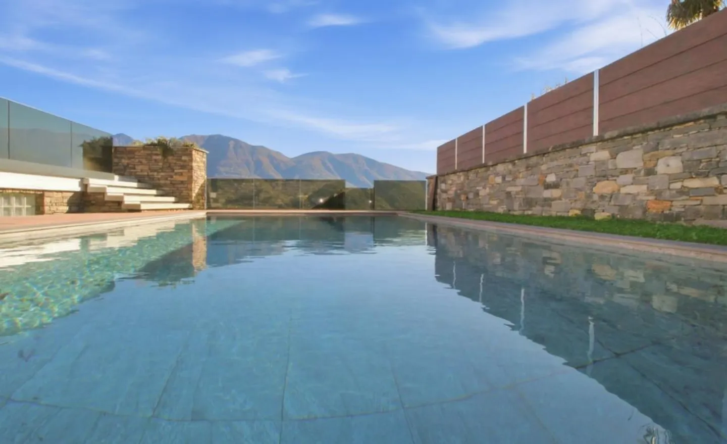 Elegante appartamento con una spaziosa oasi esterna e piscina - Foto 19 di 23
