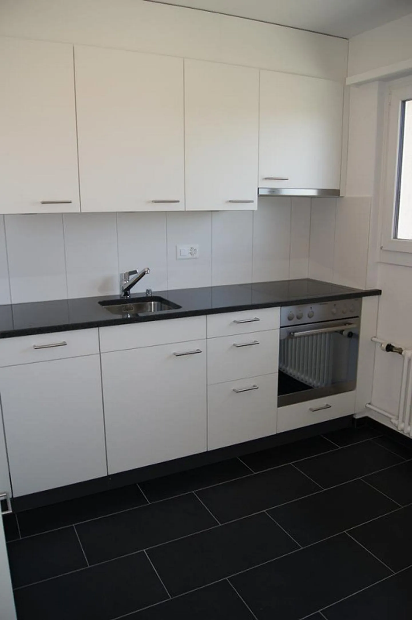 Moderne, helle 3.5-Zimmerwohnung im Hochparterre - Photo 2 of 6