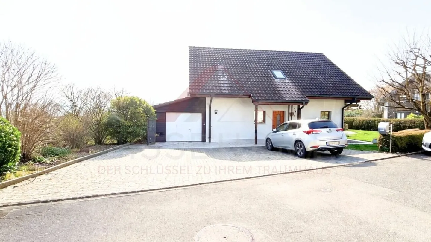 Well-maintained single-family home with idyllic garden in Seeland - Photo 2 of 15