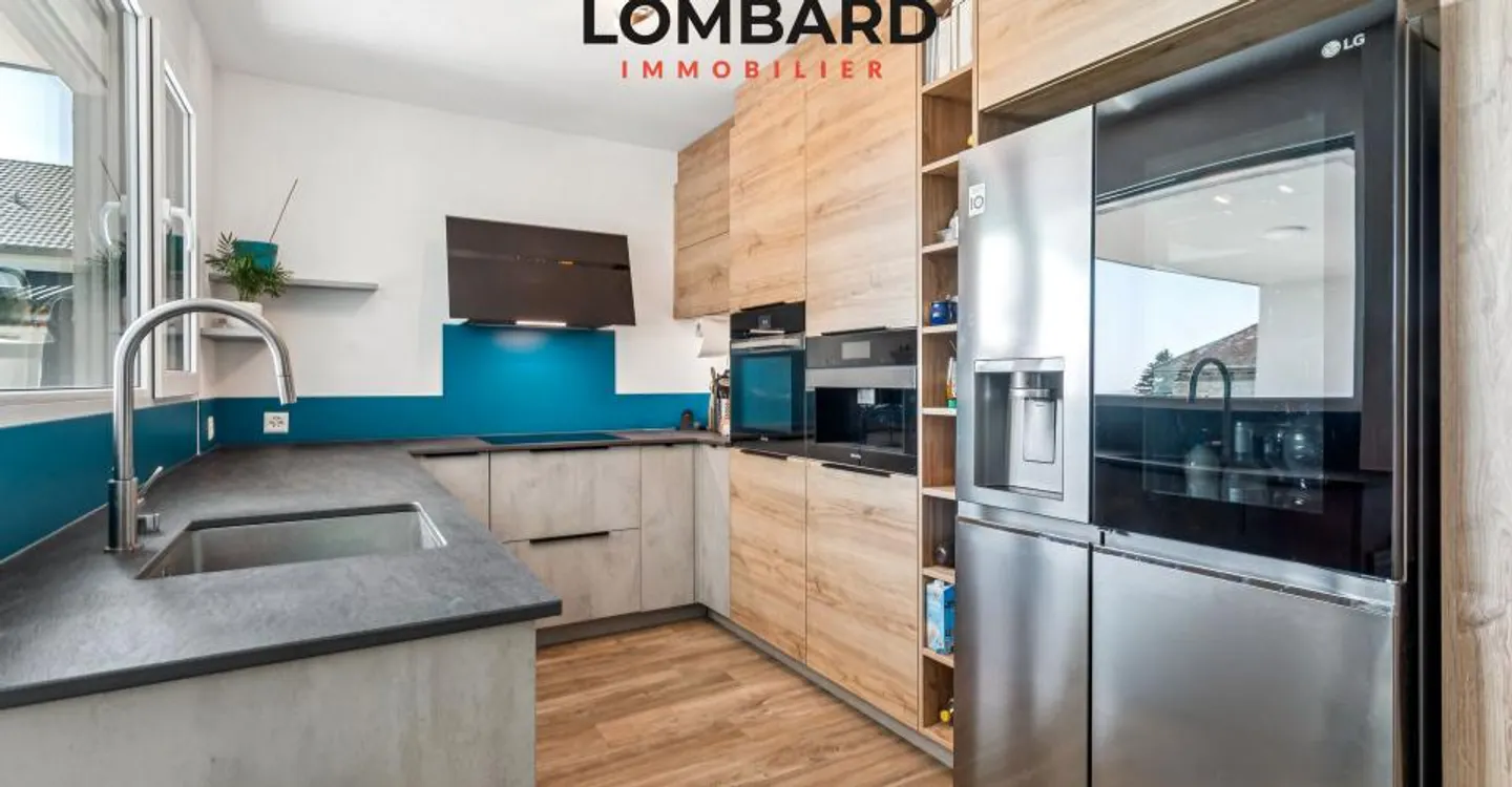 ***VENDU*** Spacieux appartement moderne de 4,5 pièces - Photo 3 sur 9