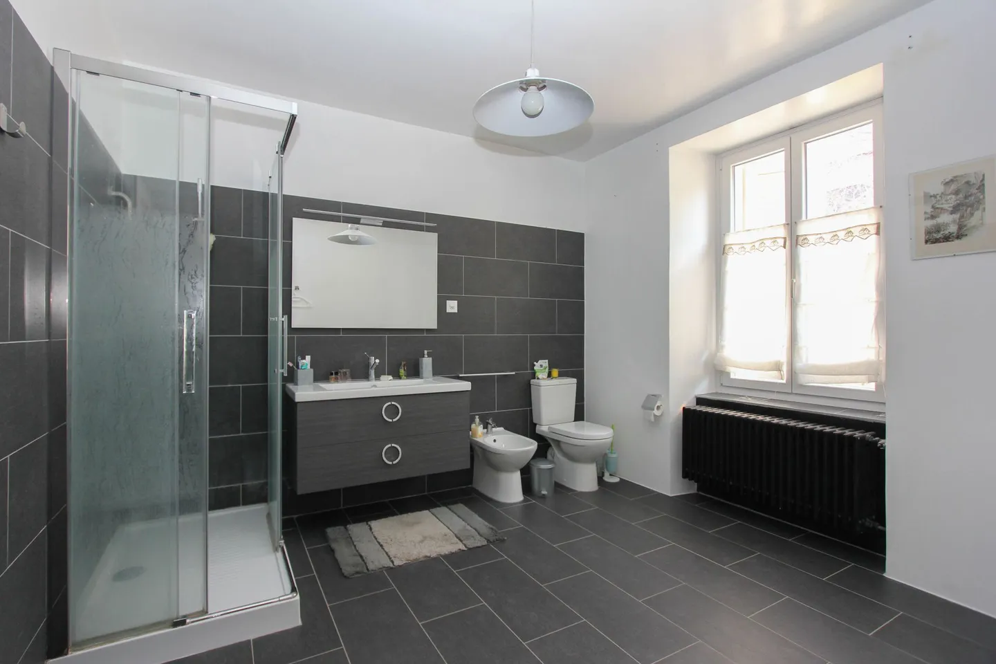 Grand appartement de rendement dans maison de maître avec jardin - Photo 10 sur 12