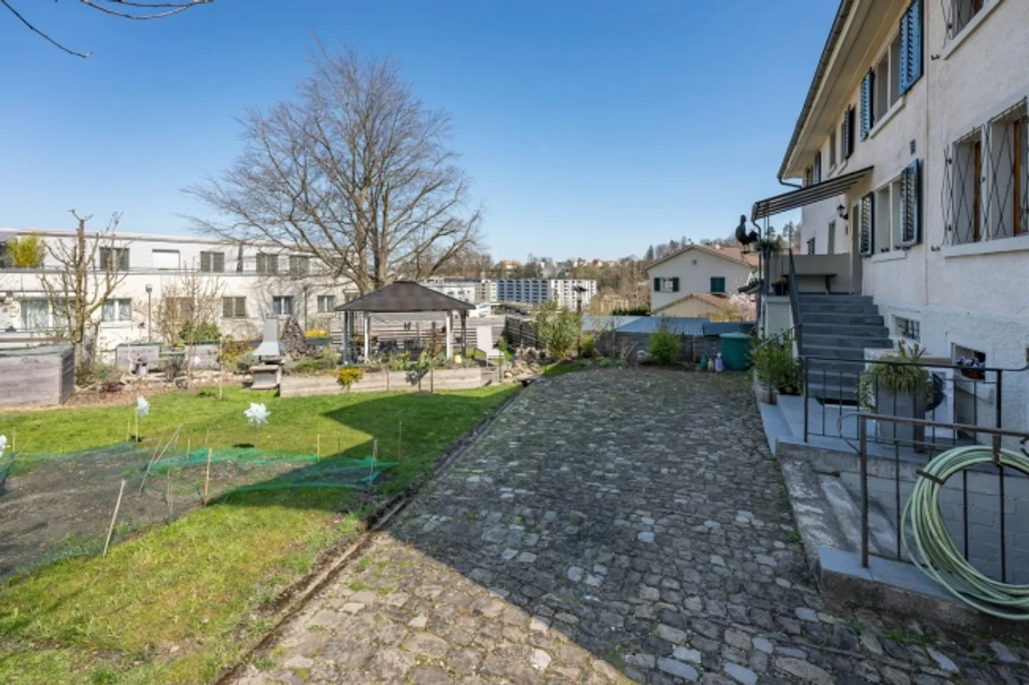 Historical three-family house with generous outdoor area and charm - Photo 3 of 8