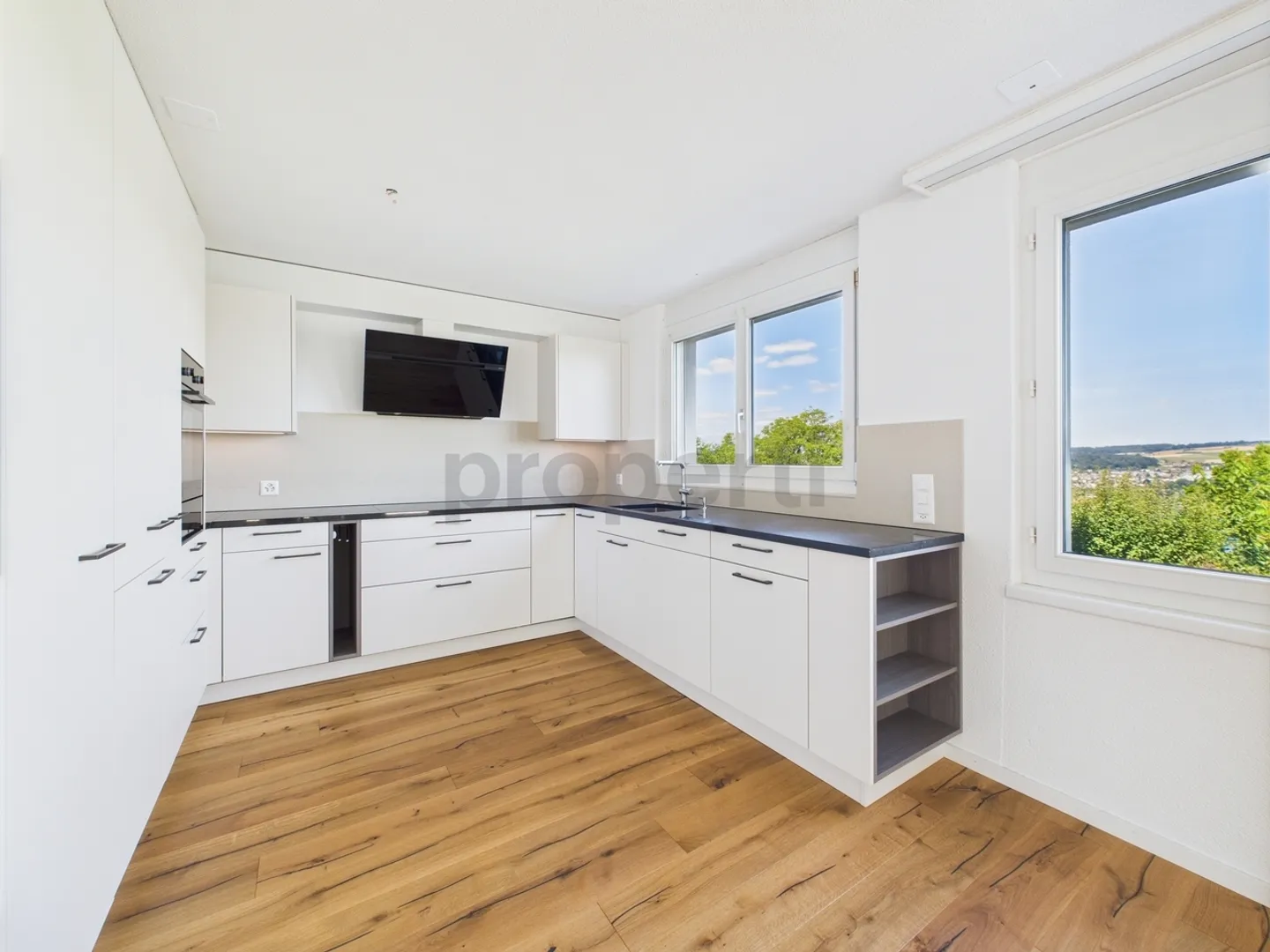 Appartamento giardino 5,5 locali appena ristrutturato con splendida vista sul lago in vendita. - Foto 5 di 13