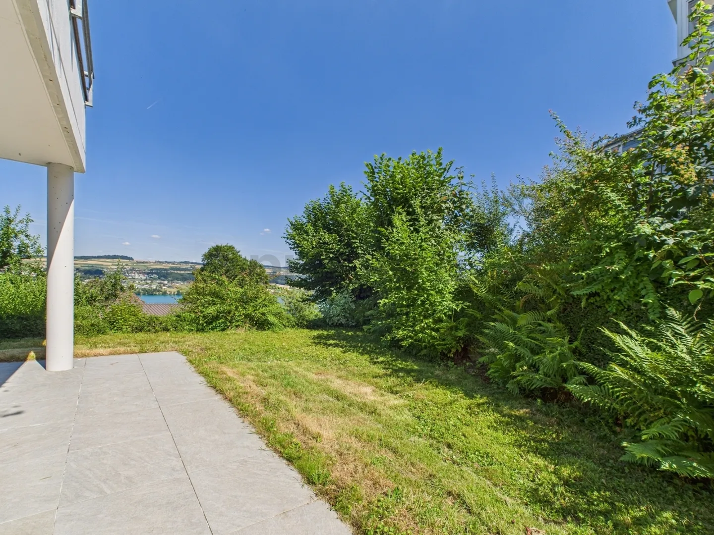 Appartamento giardino 5,5 locali appena ristrutturato con splendida vista sul lago in vendita. - Foto 12 di 13
