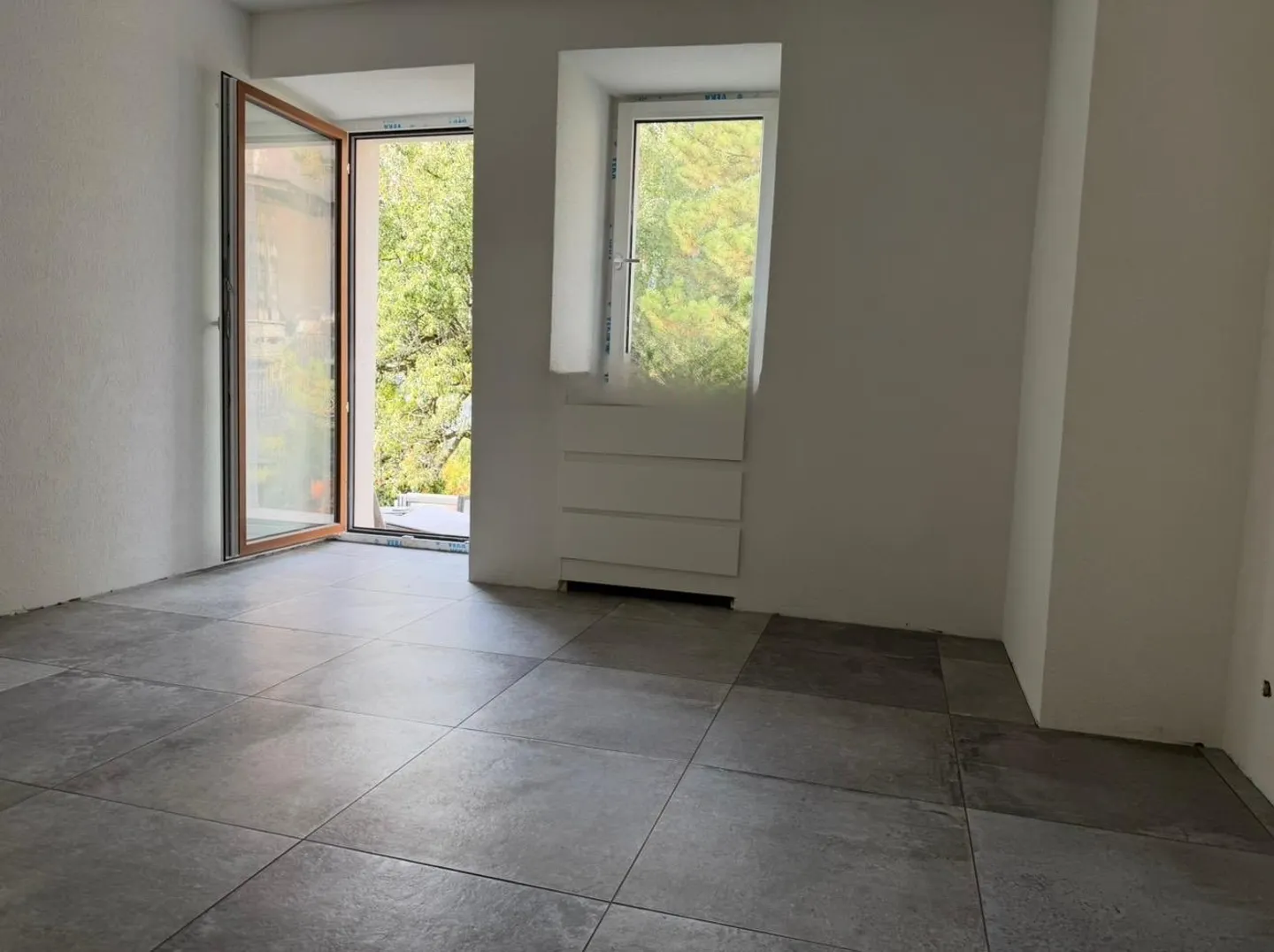 Immeuble d'appartements rénové - Photo 9 sur 14