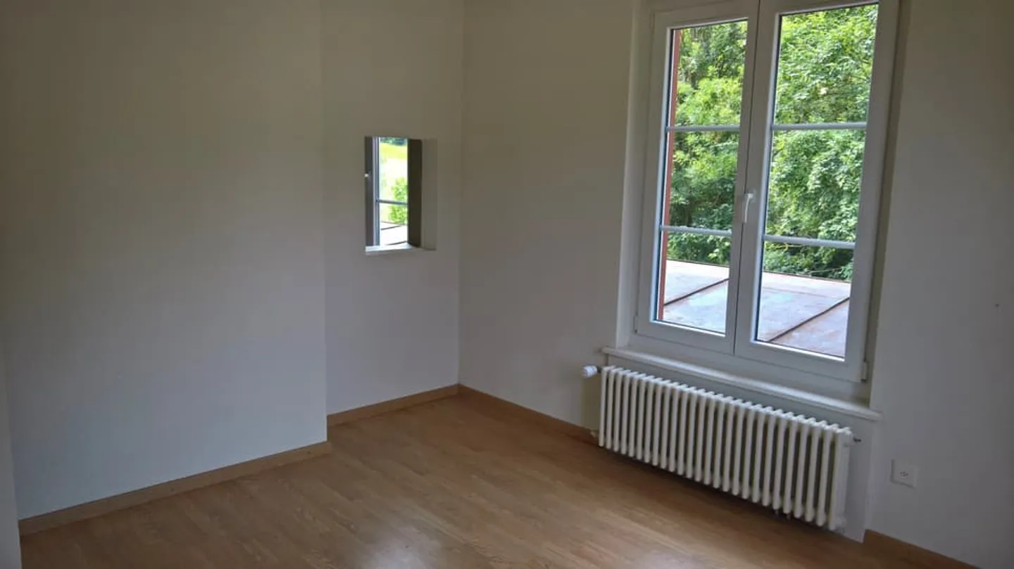 Wohnung im 1. Stock mit überdachtem Parkplatz - Foto 9 von 13