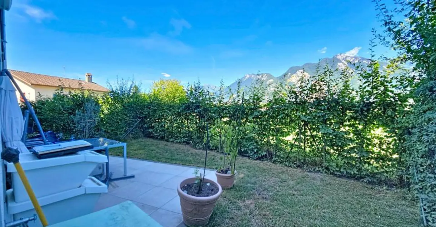 Bel Appartement avec Jardin - Photo 1 sur 13