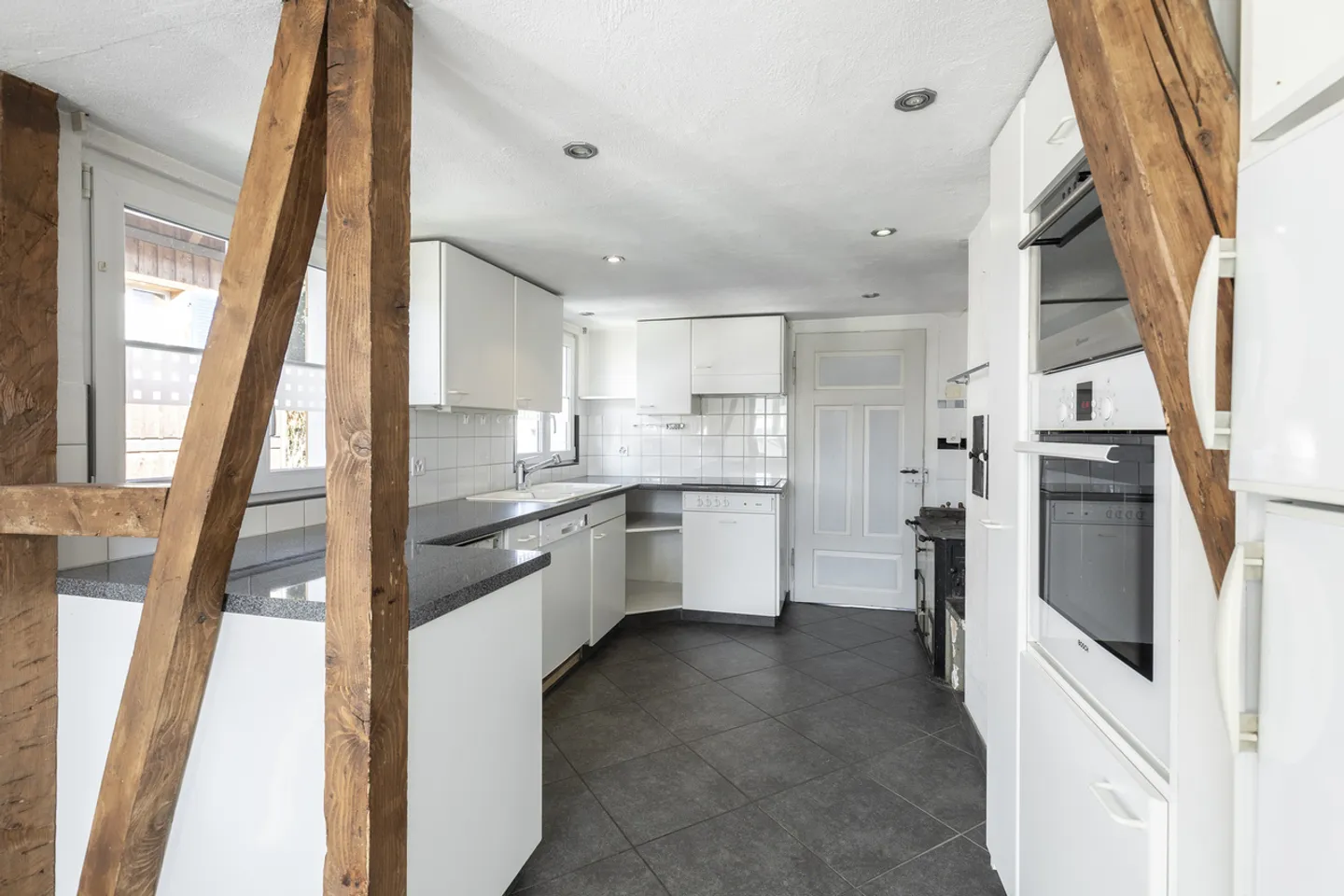 Vielseitiges Familienhaus in zentraler Lage - Foto 7 von 13