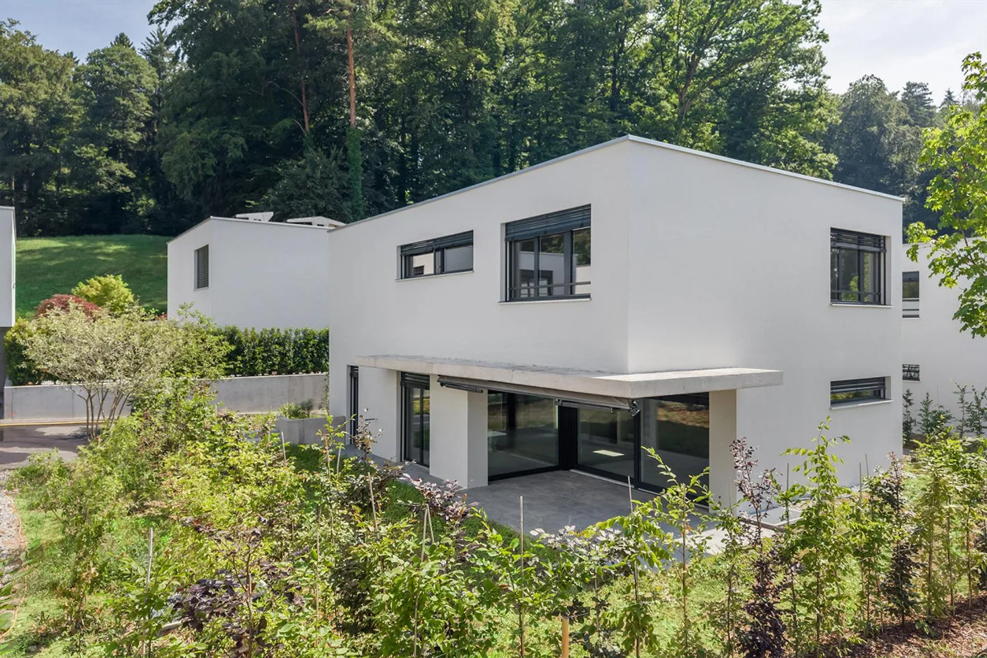 Neues Familienhaus in Oetwil - Foto 1 von 9