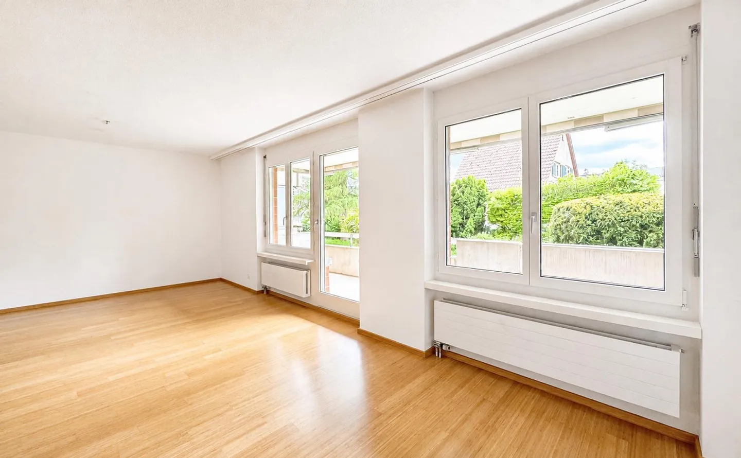 Cozy 3.5-room apartment on the ground floor in Zurich-Seebach - Photo 2 of 7