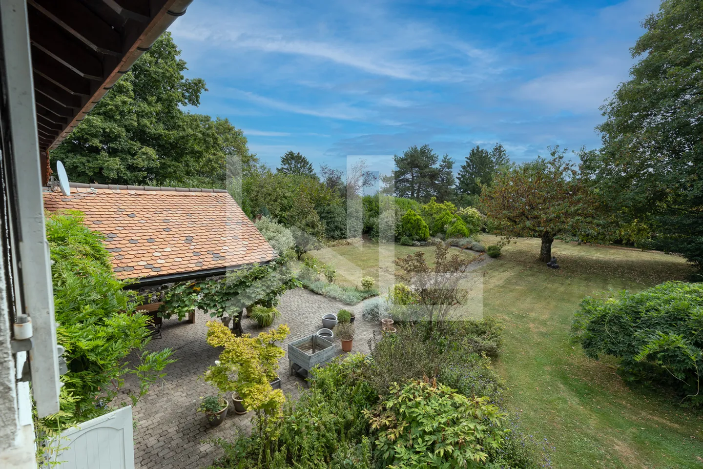 Maison de charme dans un parc arboré de 4'500 m2 - Photo 11 sur 13