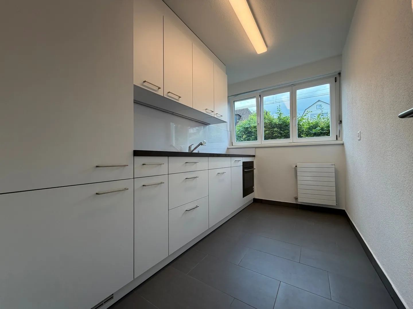 Appartement rénové avec balcon - Photo 5 sur 7