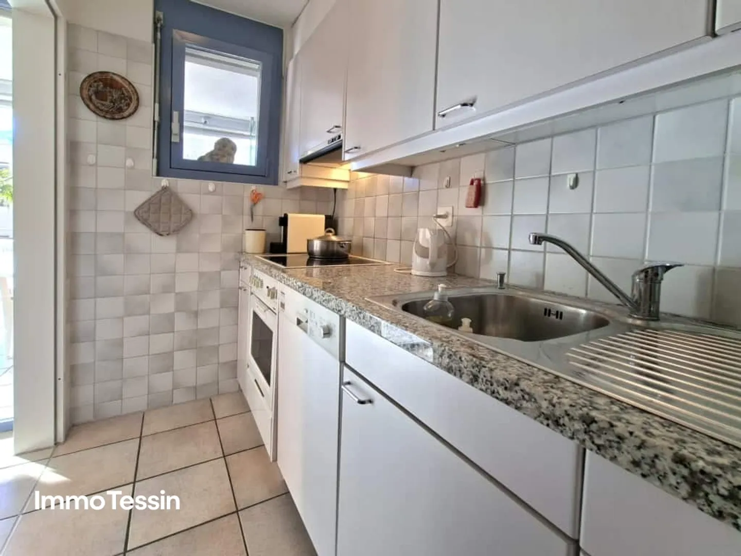 LOCARNO-MURALTO: Appartamento per vacanze perfetto vicino alla passeggiata del lago con giardino privato in una posizione ideale tra il lago e il centro città - Foto 11 di 13