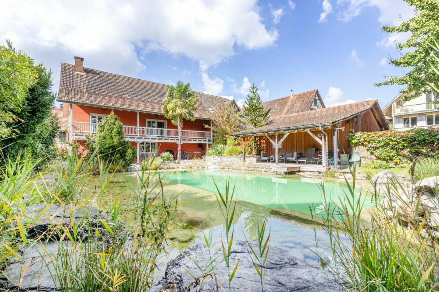 A Place to Arrive: 5.5-Room Gem with Garden Paradise & Swimming Pond - Photo 1 of 19