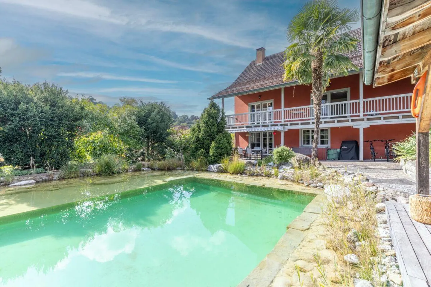 A Place to Arrive: 5.5-Room Gem with Garden Paradise & Swimming Pond - Photo 3 of 19