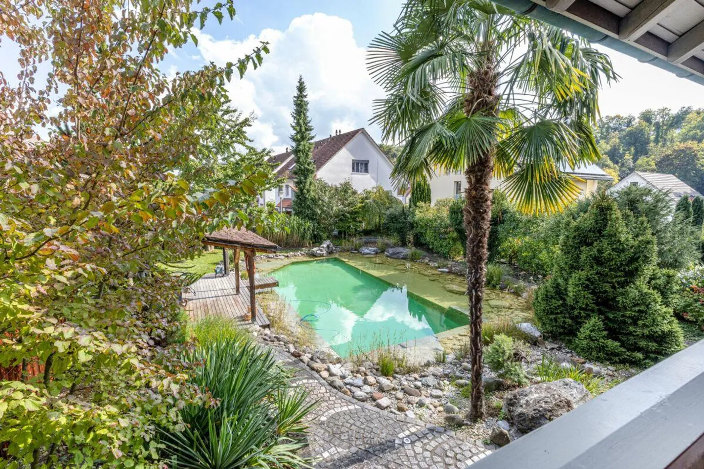 A Place to Arrive: 5.5-Room Gem with Garden Paradise & Swimming Pond - Photo 5 of 19