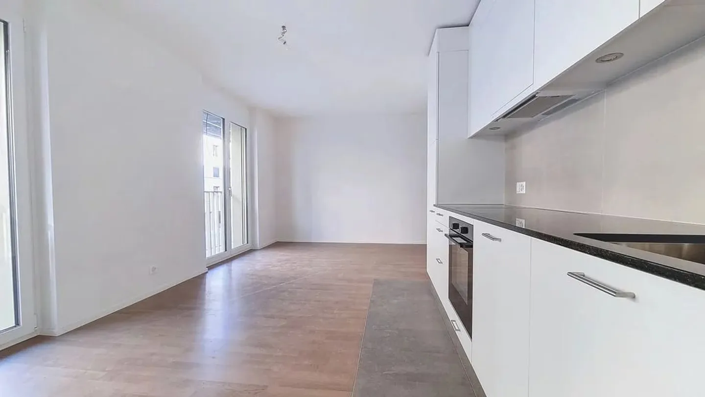Charmant appartement 2.5 pièces - Photo 3 sur 11