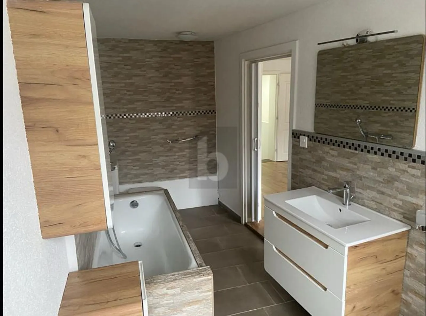 EXCLUSIVE AND FRESHLY RENOVATED - Photo 3 of 5