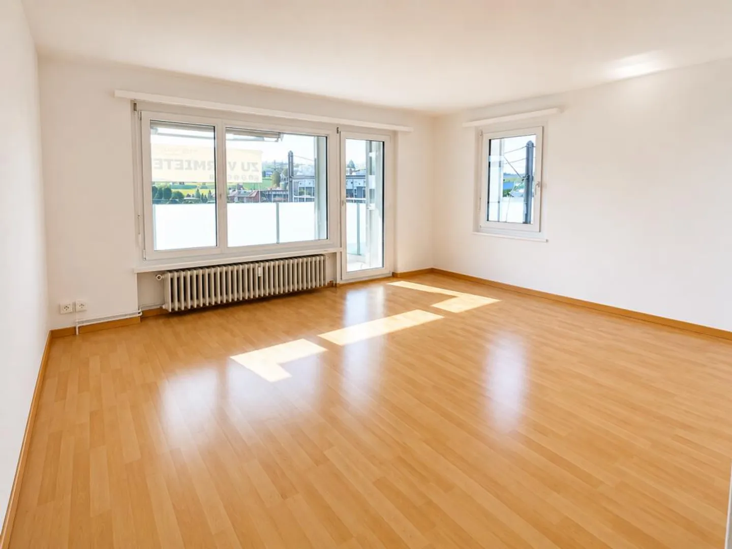 Zentrale Wohnung mit sonnigem Platz - Foto 3 von 7