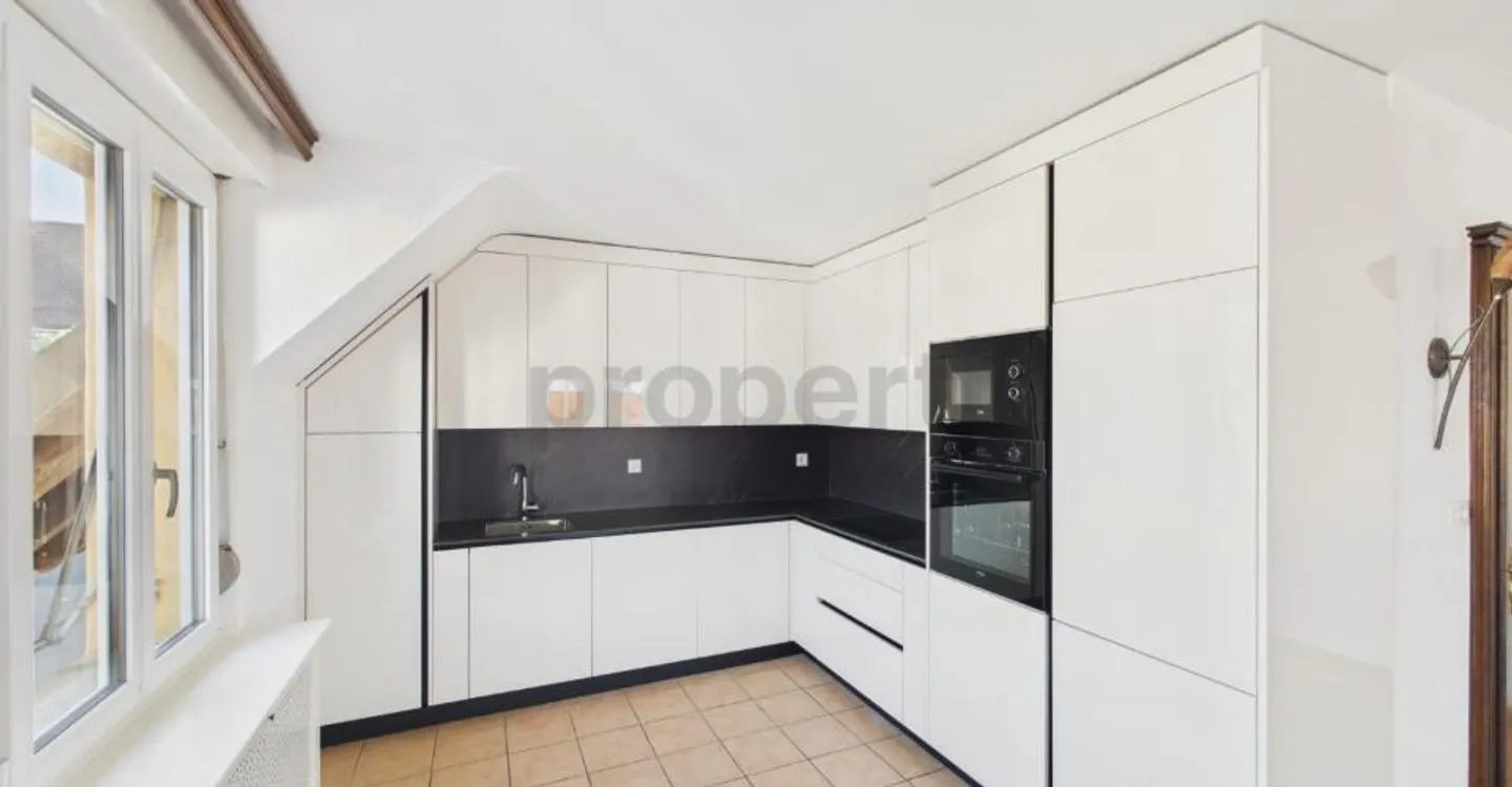 Renovierte 3,5-Zimmer-Wohnung mit Balkon und inkludierter Mietrendite - Foto 4 von 11