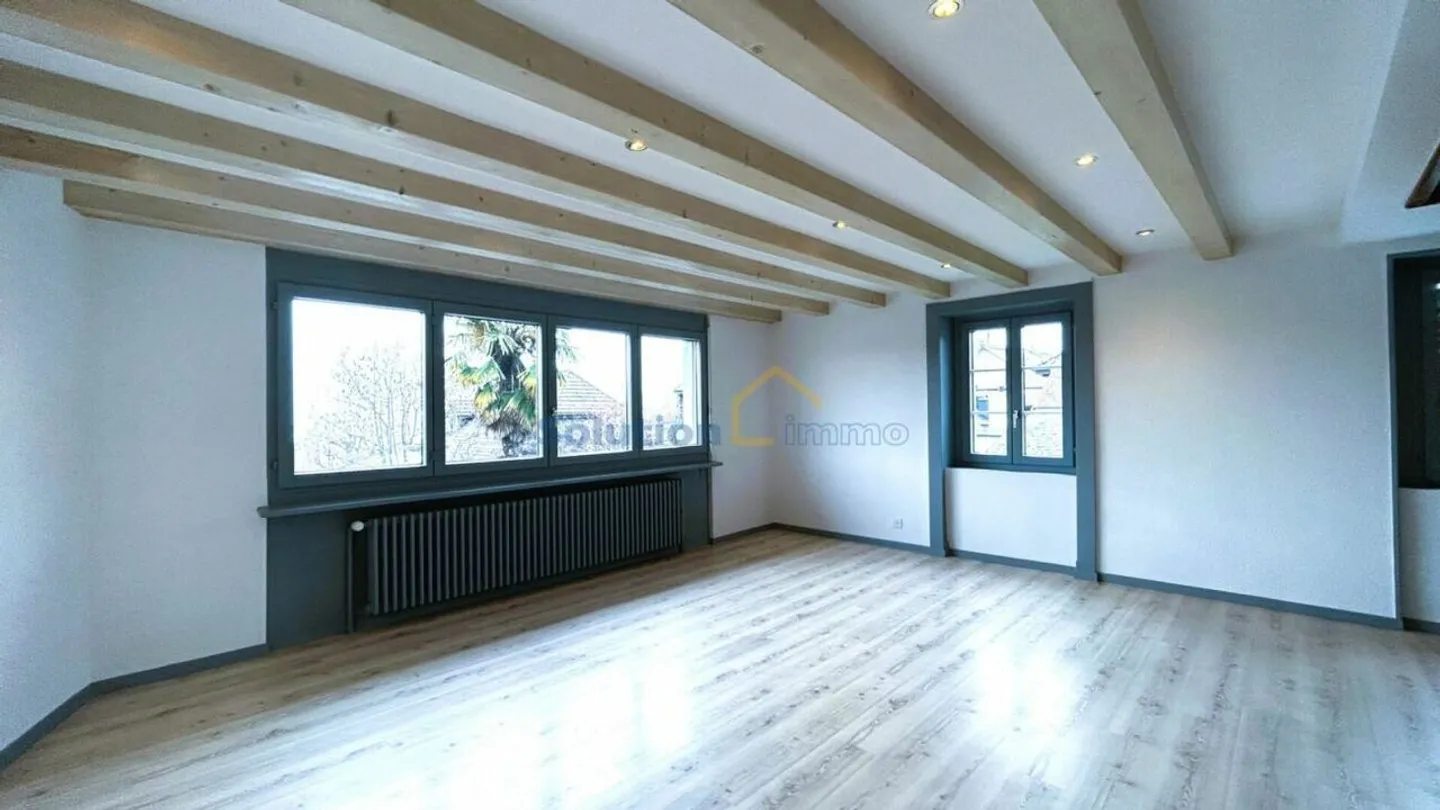 Appartement de 5,5 pièces en duplex - Photo 2 sur 13