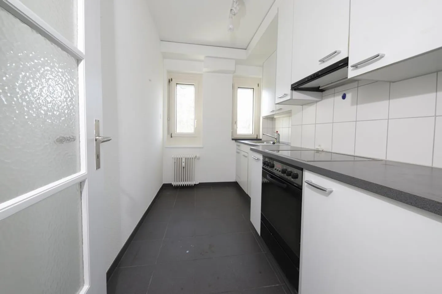 Appartement charmant dans un environnement verdoyant - Photo 3 sur 6