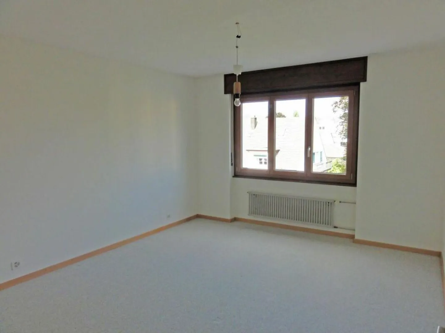 Appartement spacieux et lumineux de 4,5 pièces dans le quartier de Zelgli - Photo 4 sur 8