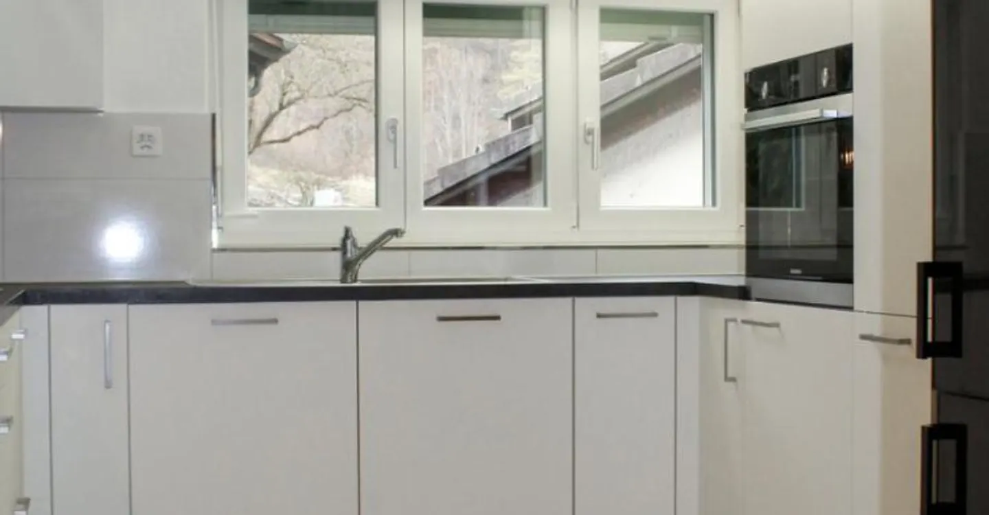3,5-Zimmer-Wohnung im 1. Stock mit Balkon und Dachboden - Foto 1 von 11