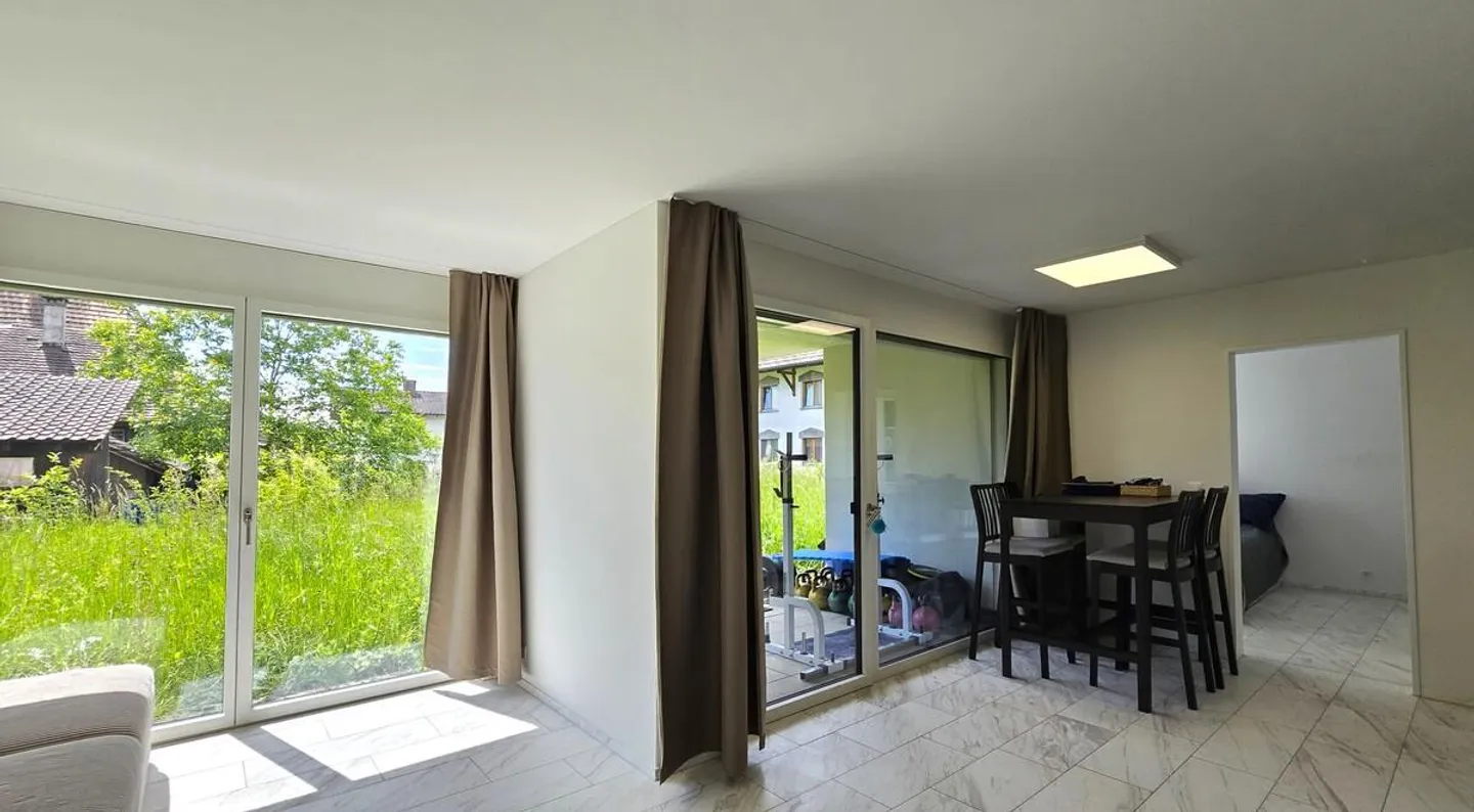 Modernes Erdgeschoss-Apartment - Foto 2 von 9