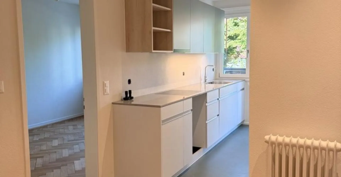 Appartement de 2,5 pièces entièrement rénové avec un standard de construction moderne - Photo 7 sur 8