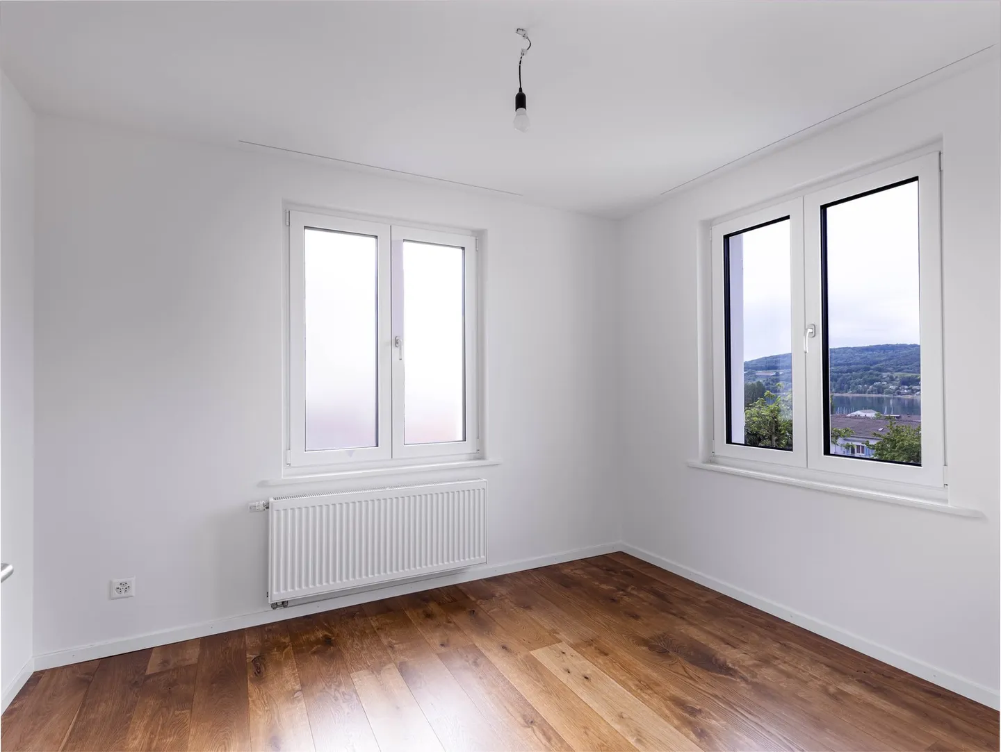 Luminoso appartamento di 3,5 locali con vista lago - Foto 5 di 9