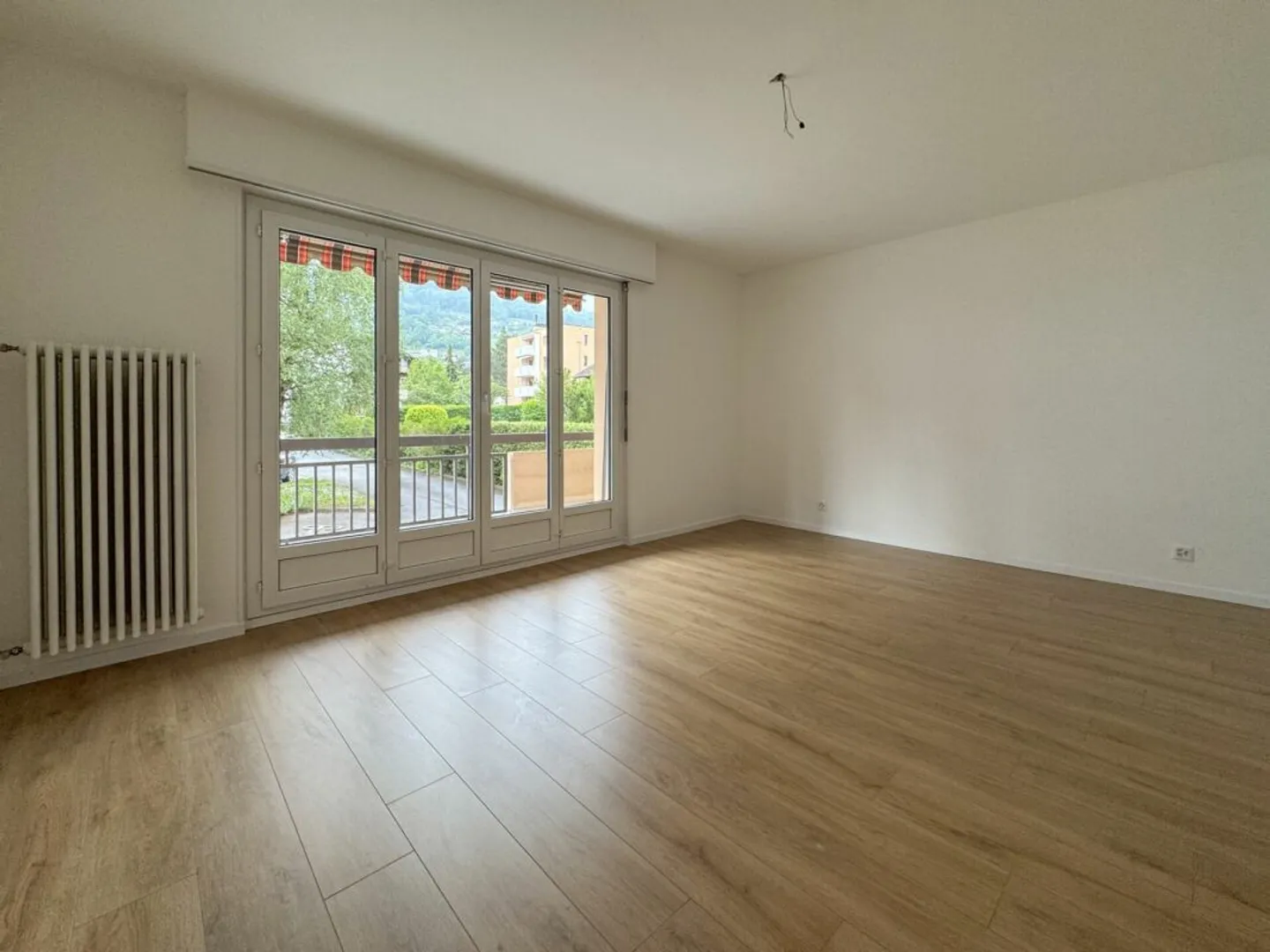 Wohnung mit 4,5 Zimmern, renoviertem Balkon und vermietet - Foto 6 von 18