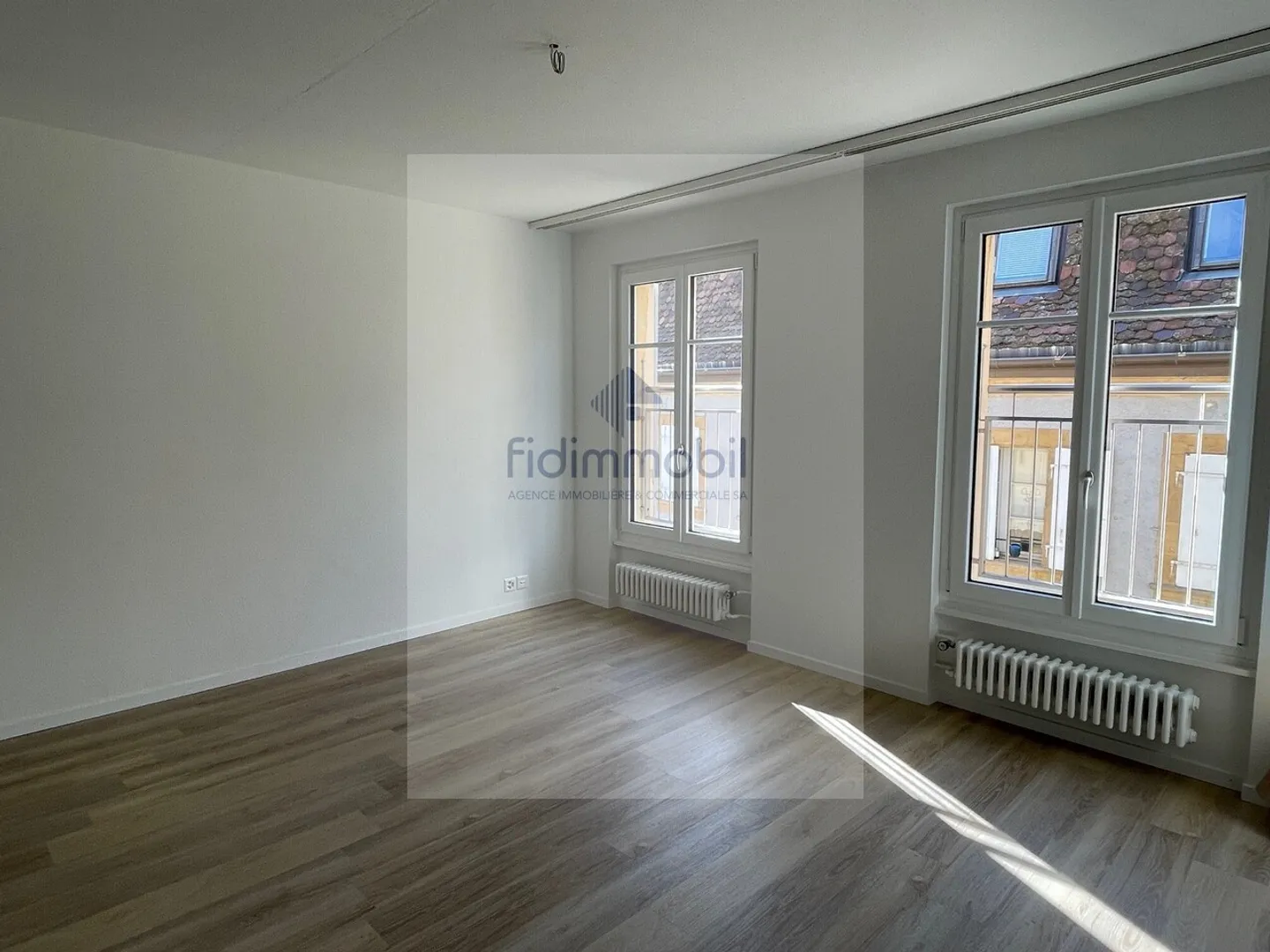 Appartement à louer - Photo 2 sur 4