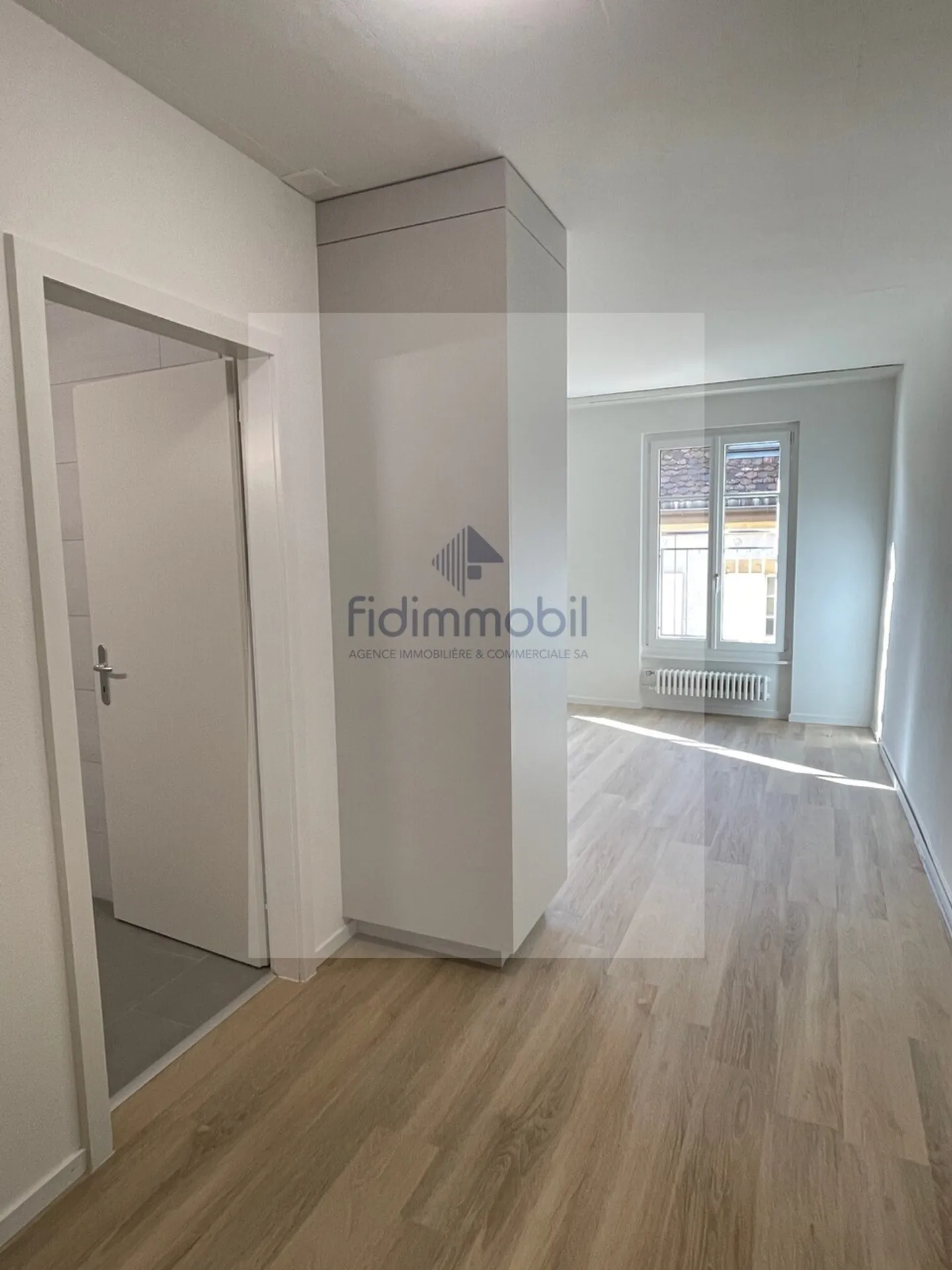 Appartement à louer - Photo 3 sur 4