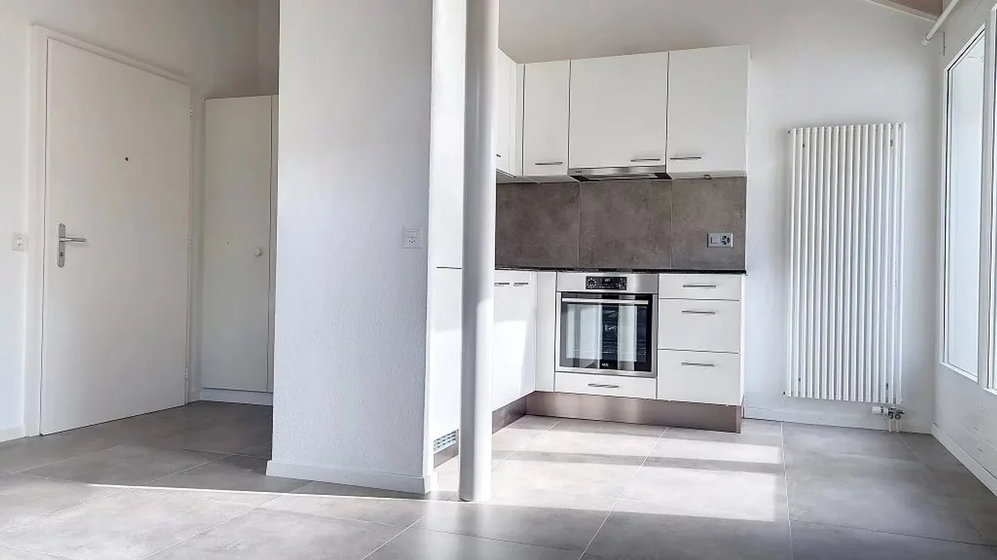 Charmant Appartement en Attique à Sion - Photo 3 sur 8