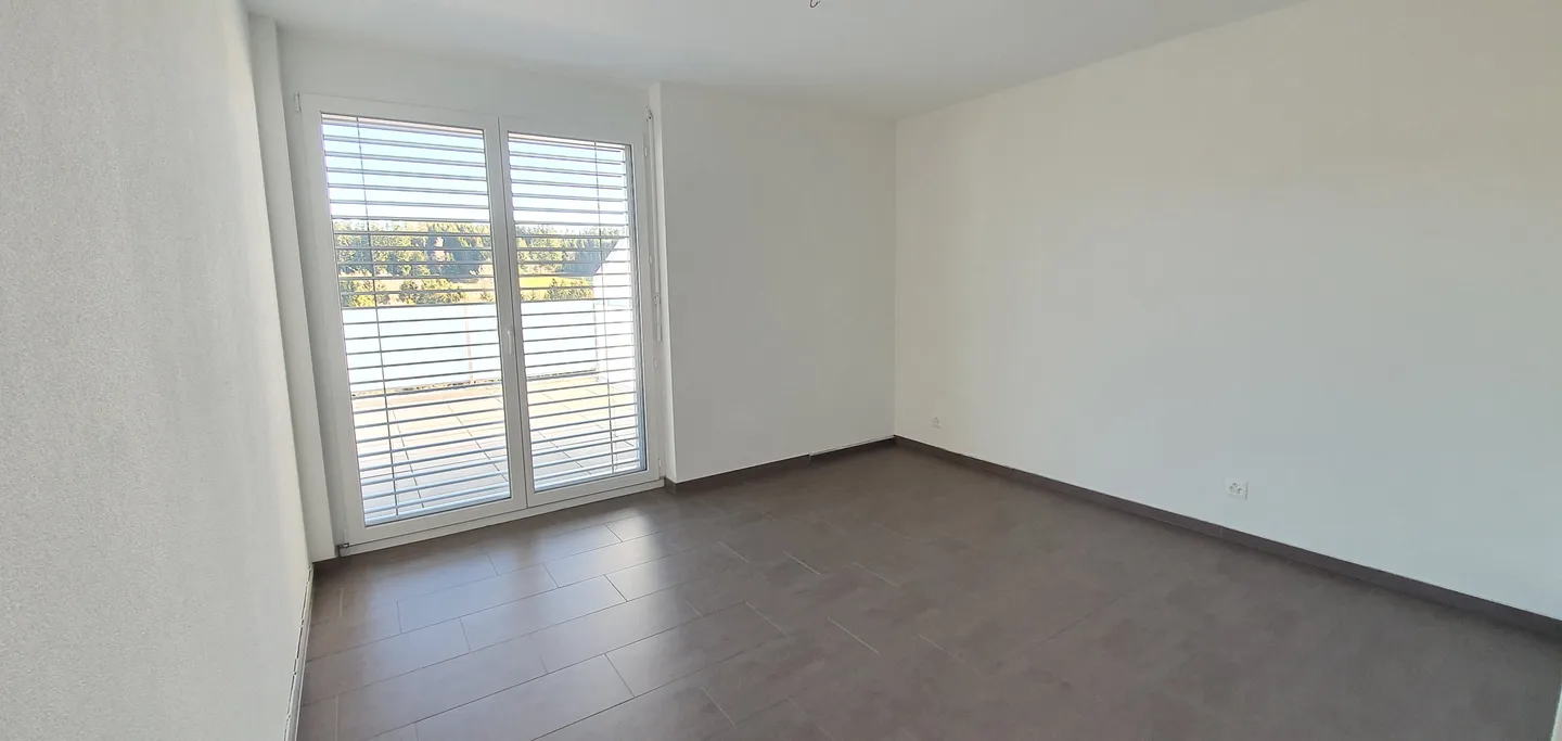 Charmante Attikwohnung - Foto 3 von 4