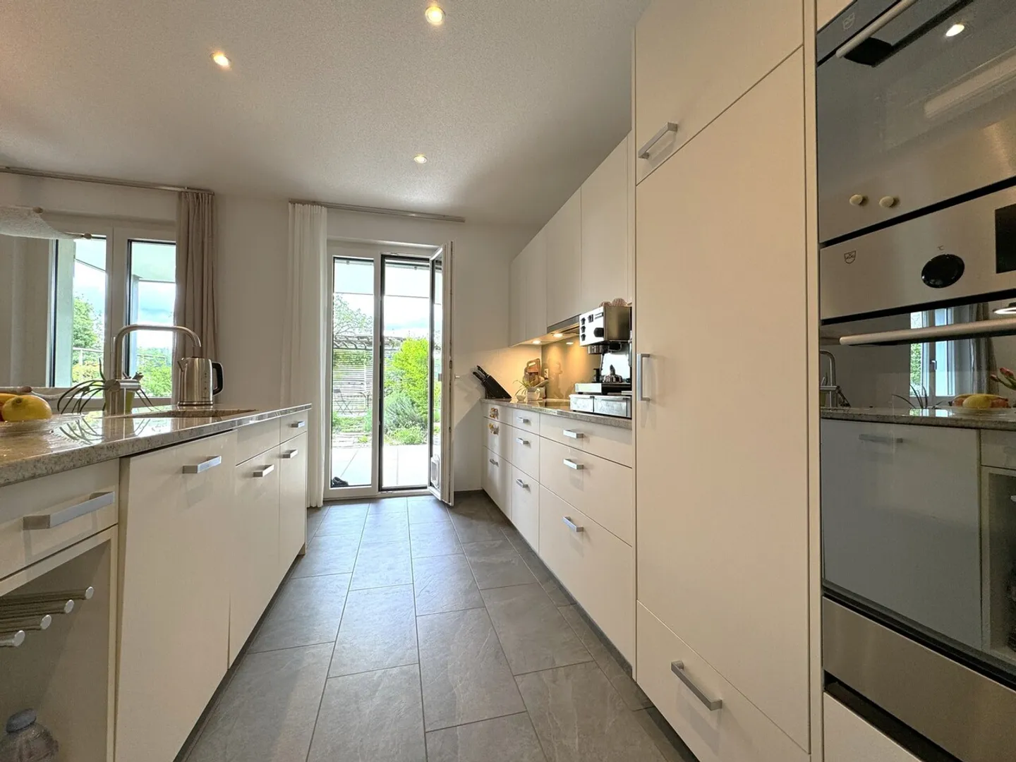 Appartement de jardin presque neuf et élégant - Photo 5 sur 12