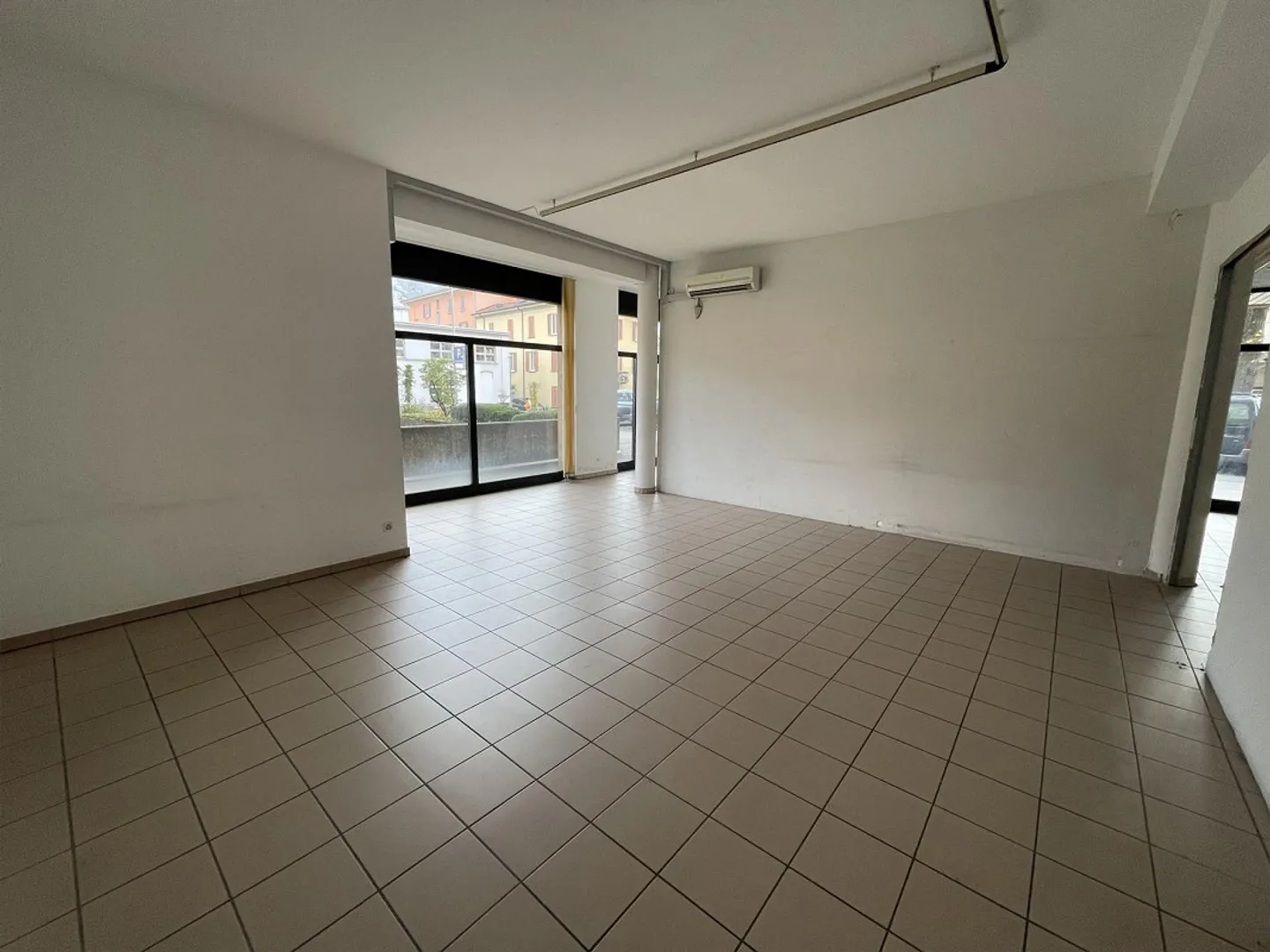 SPACIOUS COMMERCIAL SPACE WITH WINDOWS IN A HIGH-TRAFFIC AREA - Photo 6 of 13