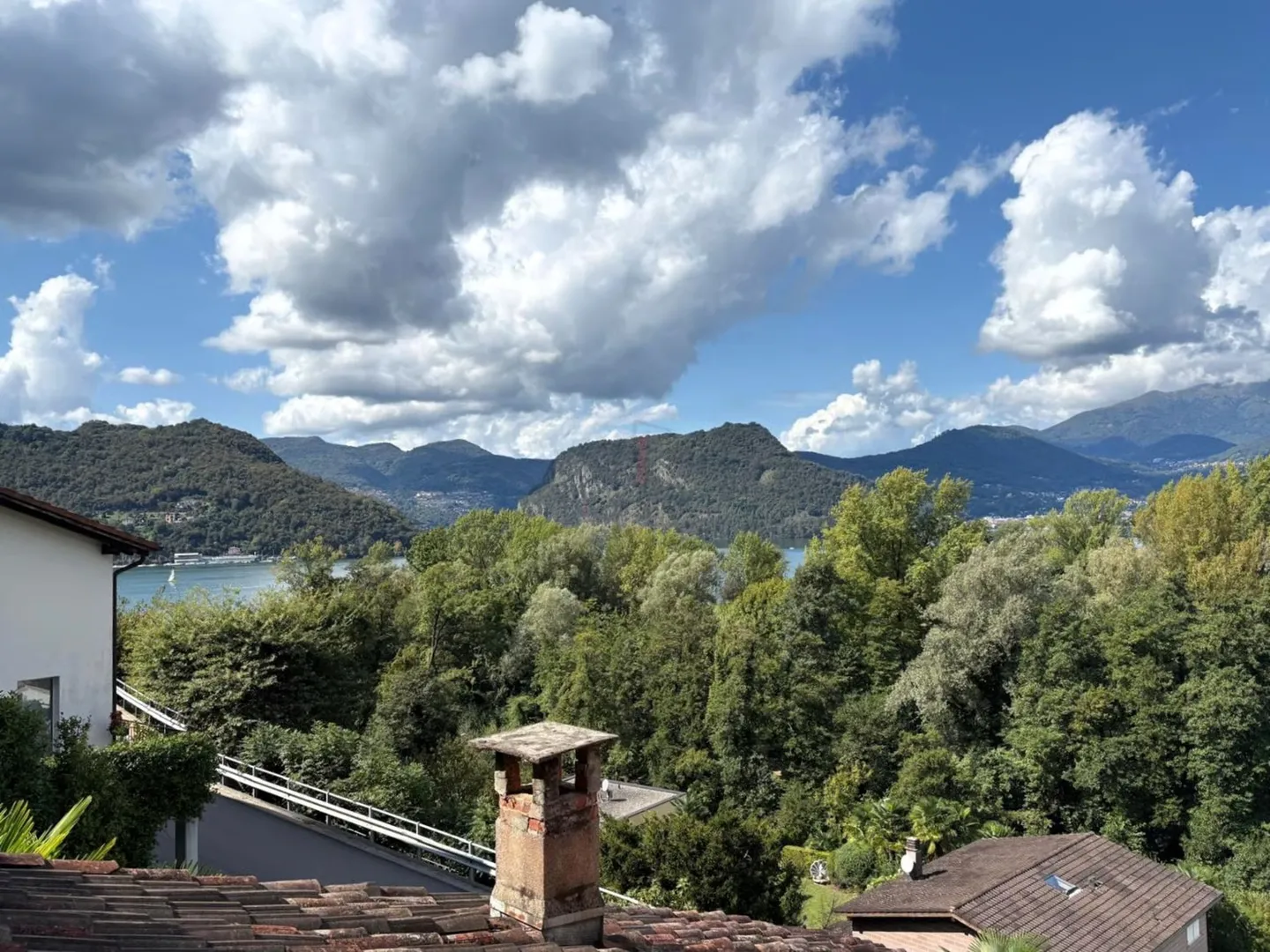 Beautiful house with garden and partial lake view - Photo 1 of 13