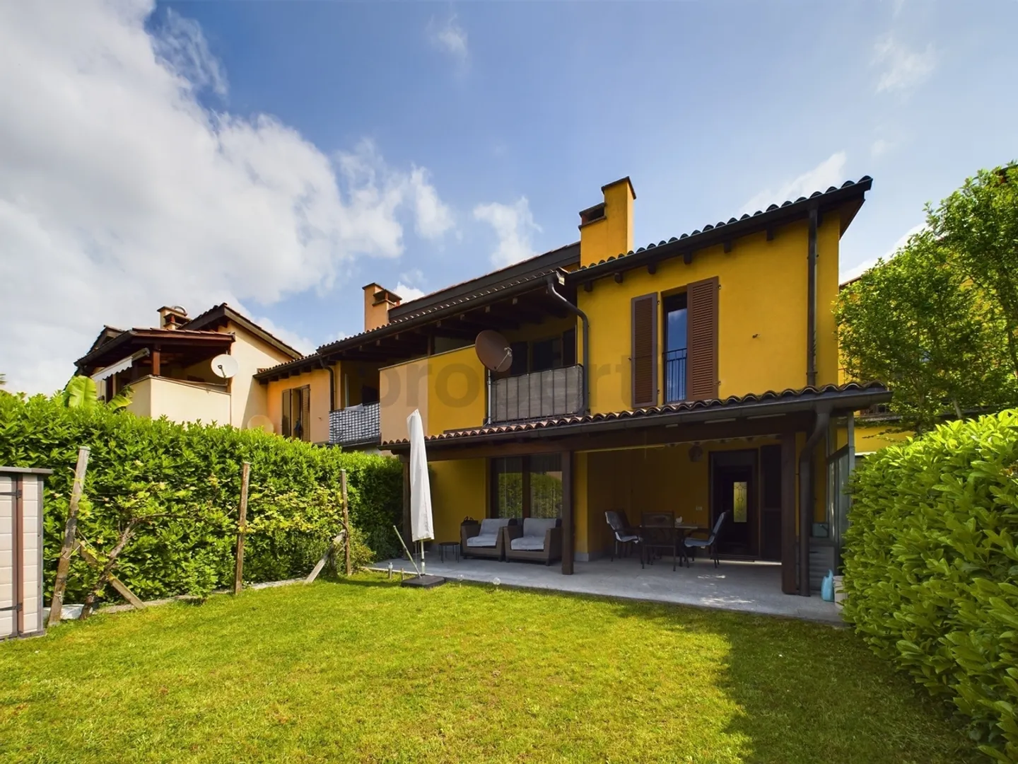 Einladendes 4.5-Zimmer-Reihenhaus in Caslano / Invitante casa a schiera di 4,5 locali a Caslano - Foto 1 von 12