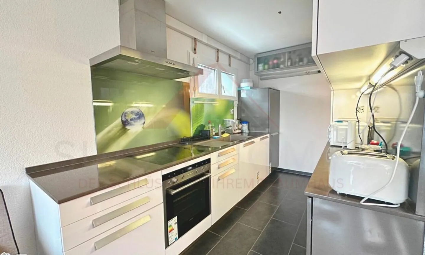 Appartement 5.5 pièces rénové - Photo 6 sur 13