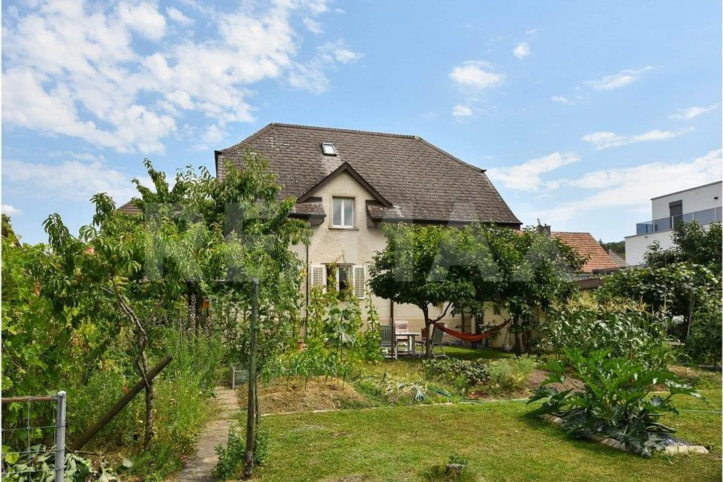Detached two-family house with spacious garden - Photo 1 of 13