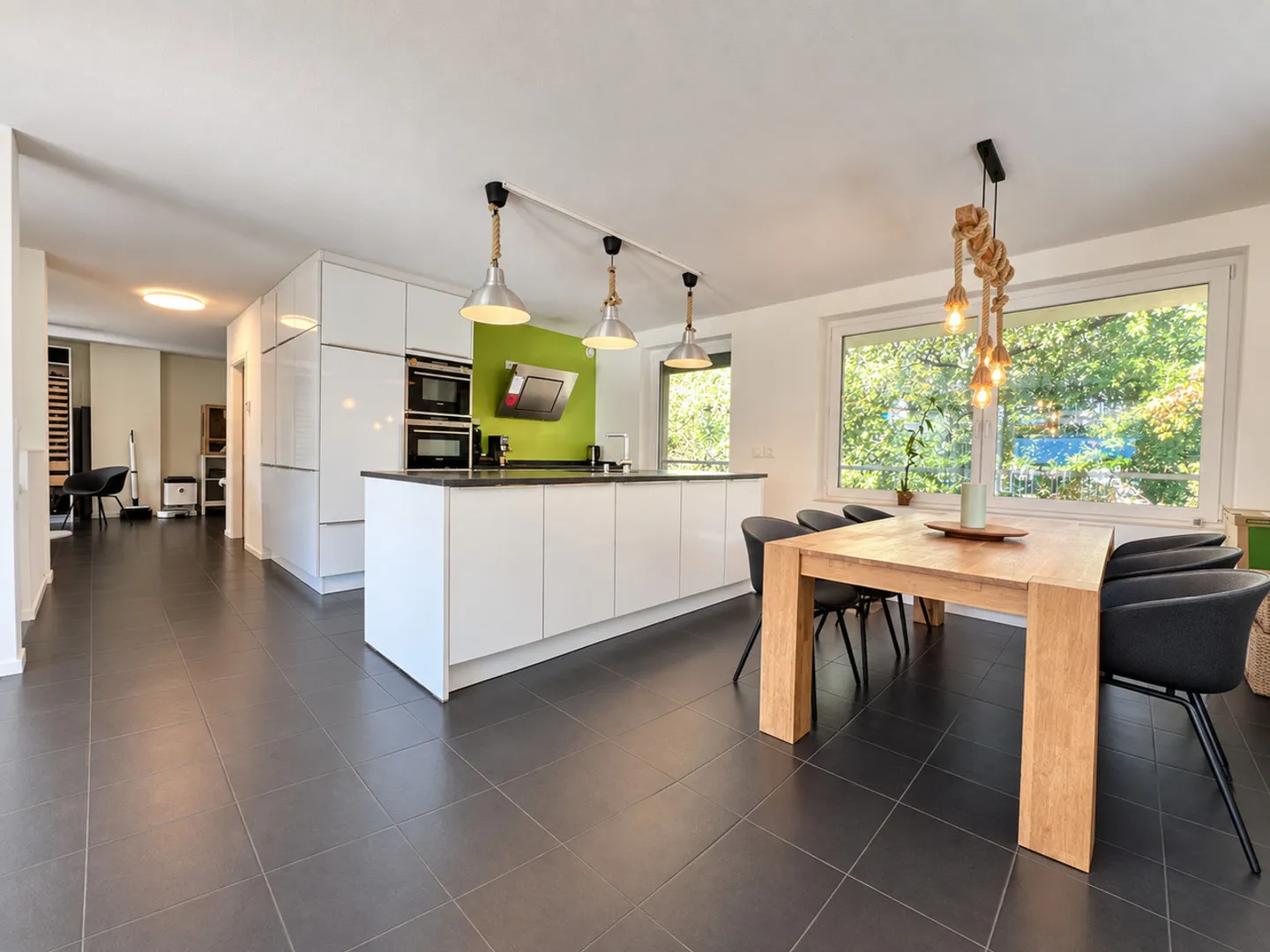 Large duplex apartment on garden level, Minergie building - Photo 2 of 13