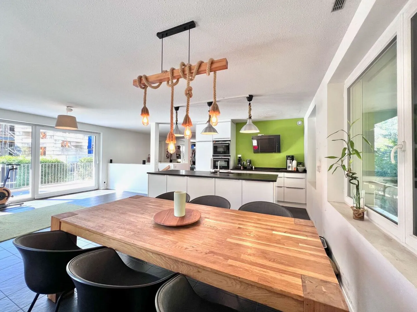 Large duplex apartment on garden level, Minergie building - Photo 4 of 13