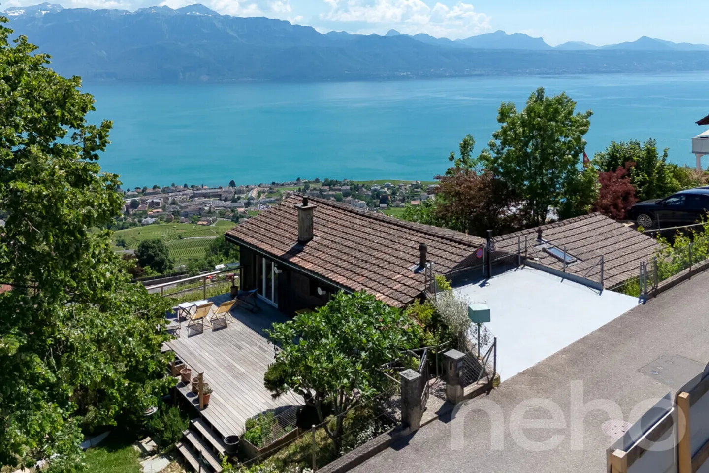 The Elegance of a Chalet between Lake, Vineyards, and Mountains - Photo 1 of 12