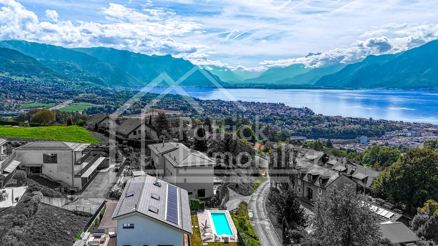 Exceptional contemporary property with panoramic view of the lake - Photo 13 of 14