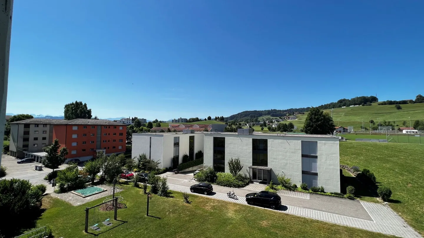 Charmante Dachwohnung mit Balkon - Foto 6 von 7