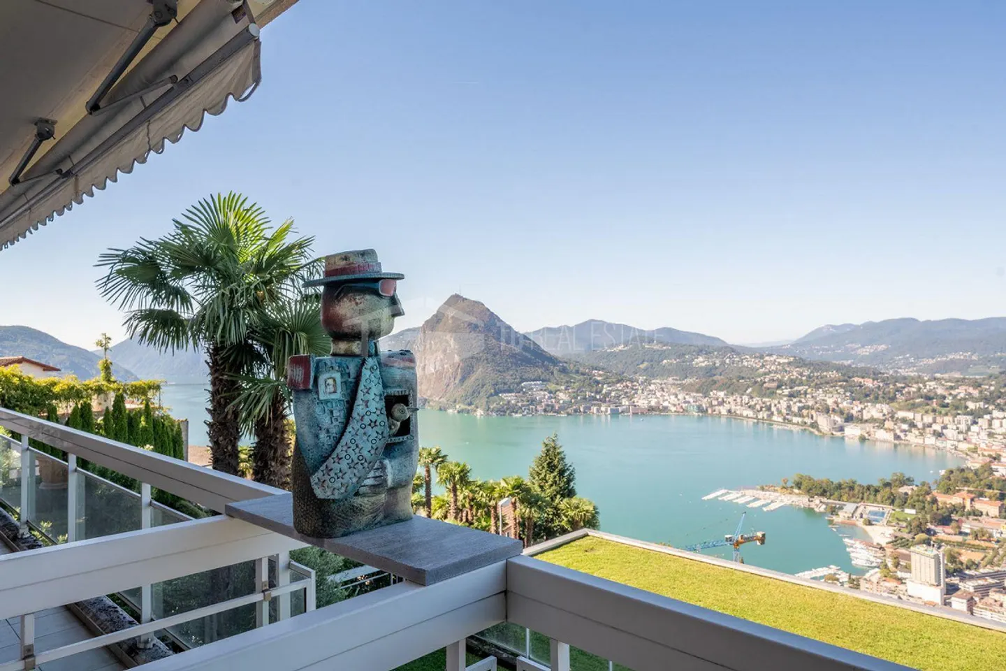 DUPLEX WITH GARDEN AND PANORAMIC VIEW OF THE LAKE - Photo 3 of 30