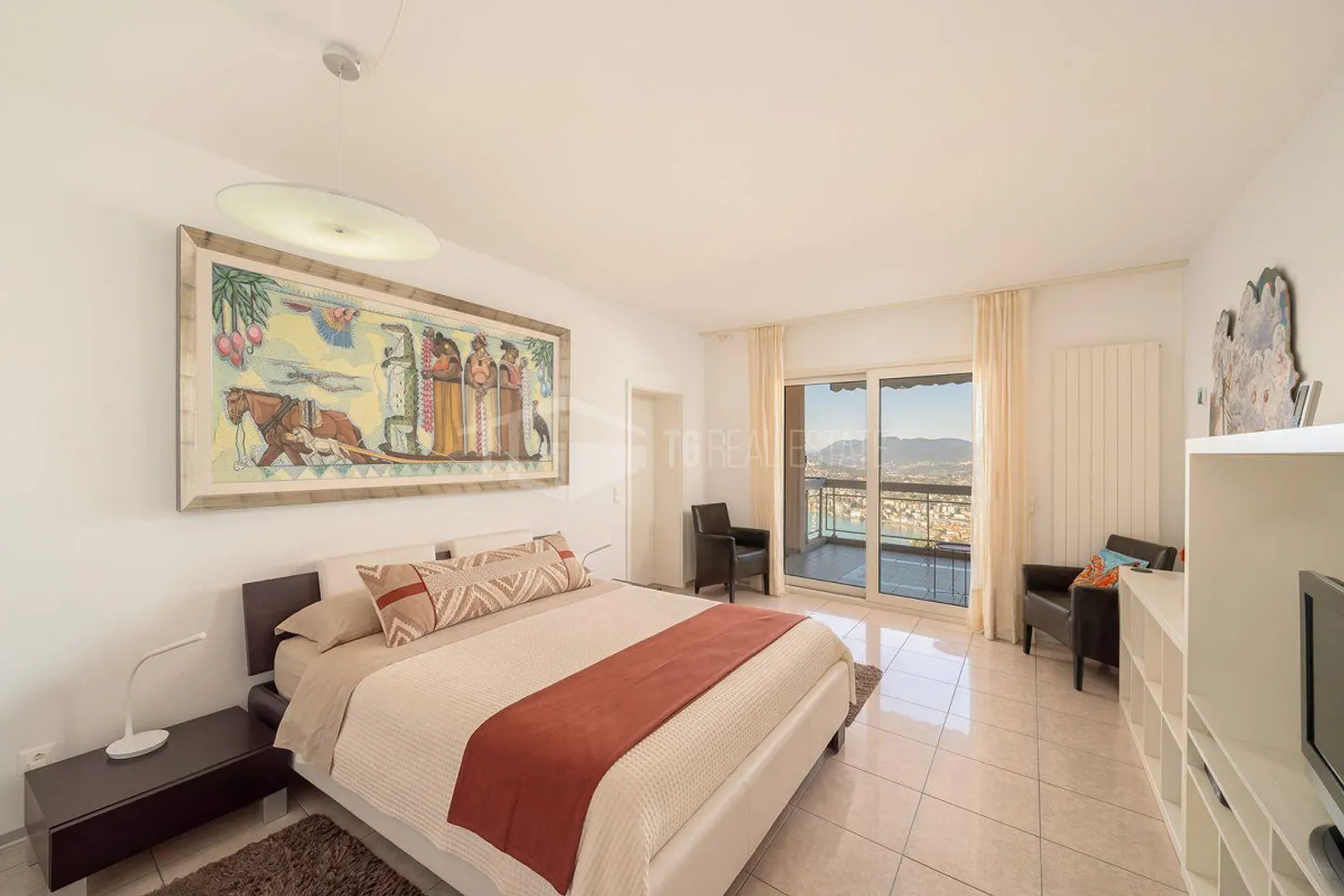 DUPLEX WITH GARDEN AND PANORAMIC VIEW OF THE LAKE - Photo 12 of 30